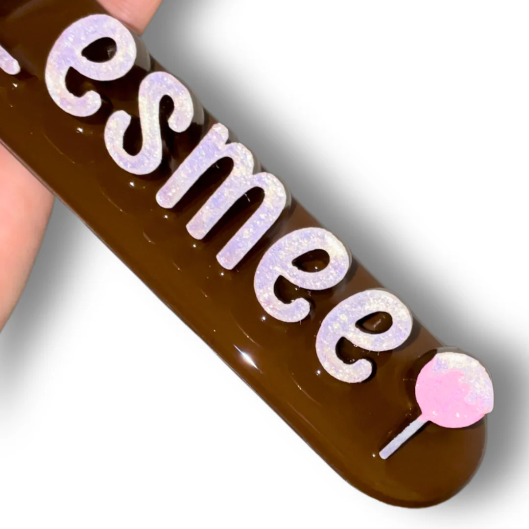 Brown nameplate with CakePop #25
